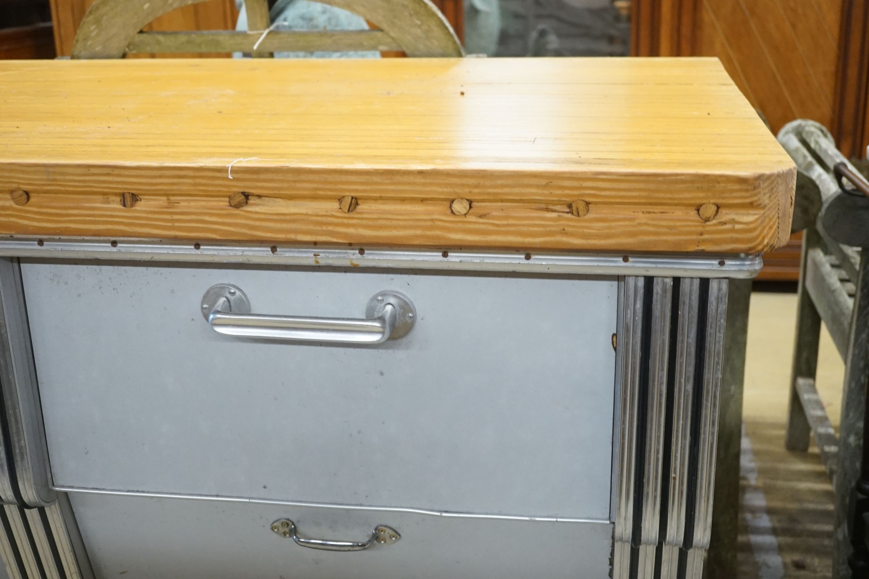 A mid 20th century shop counter cabinet with pine strip work top, width 152cm depth 71cm height 88cm